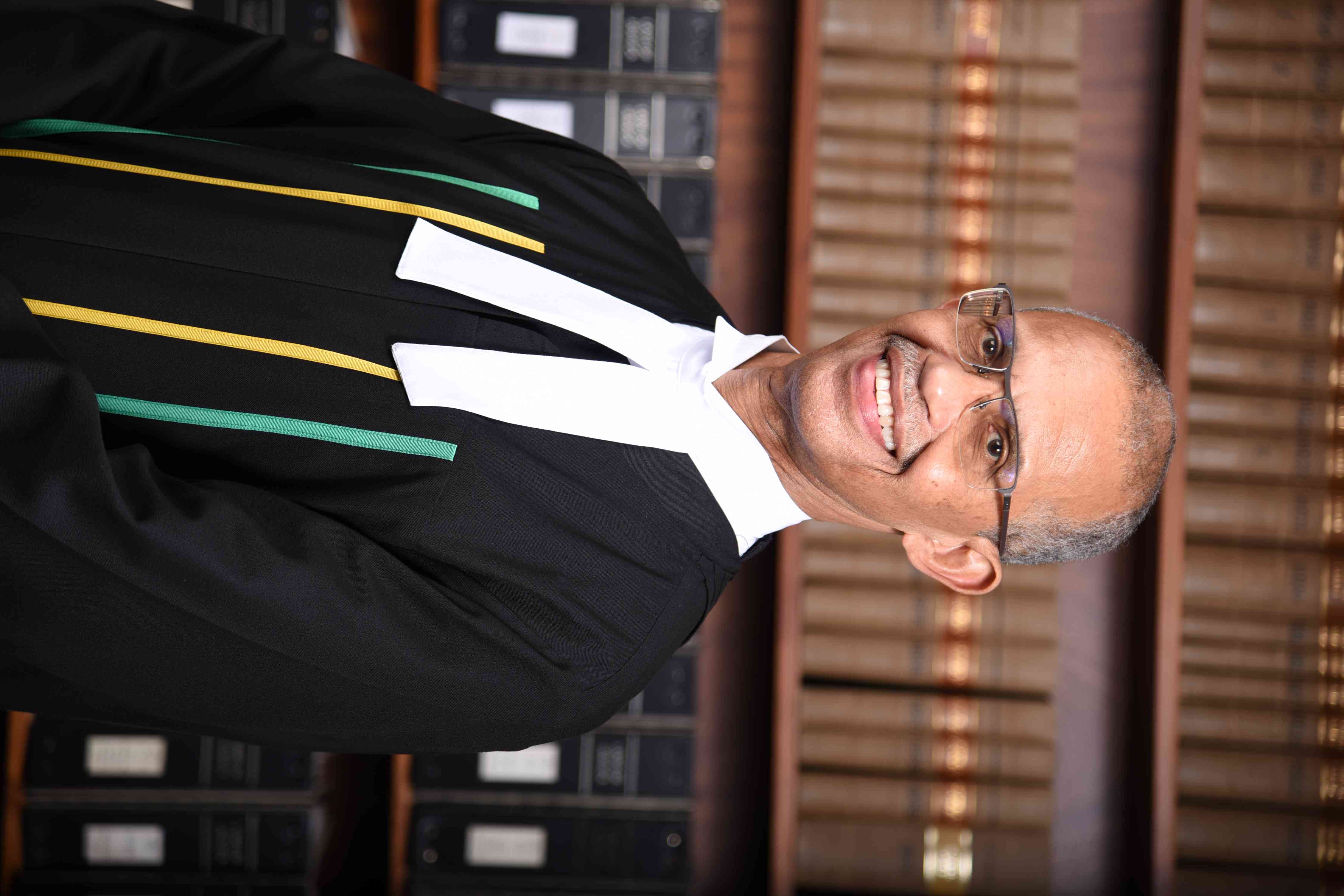 The Honourable Mr Justice Patrick Brooks, P